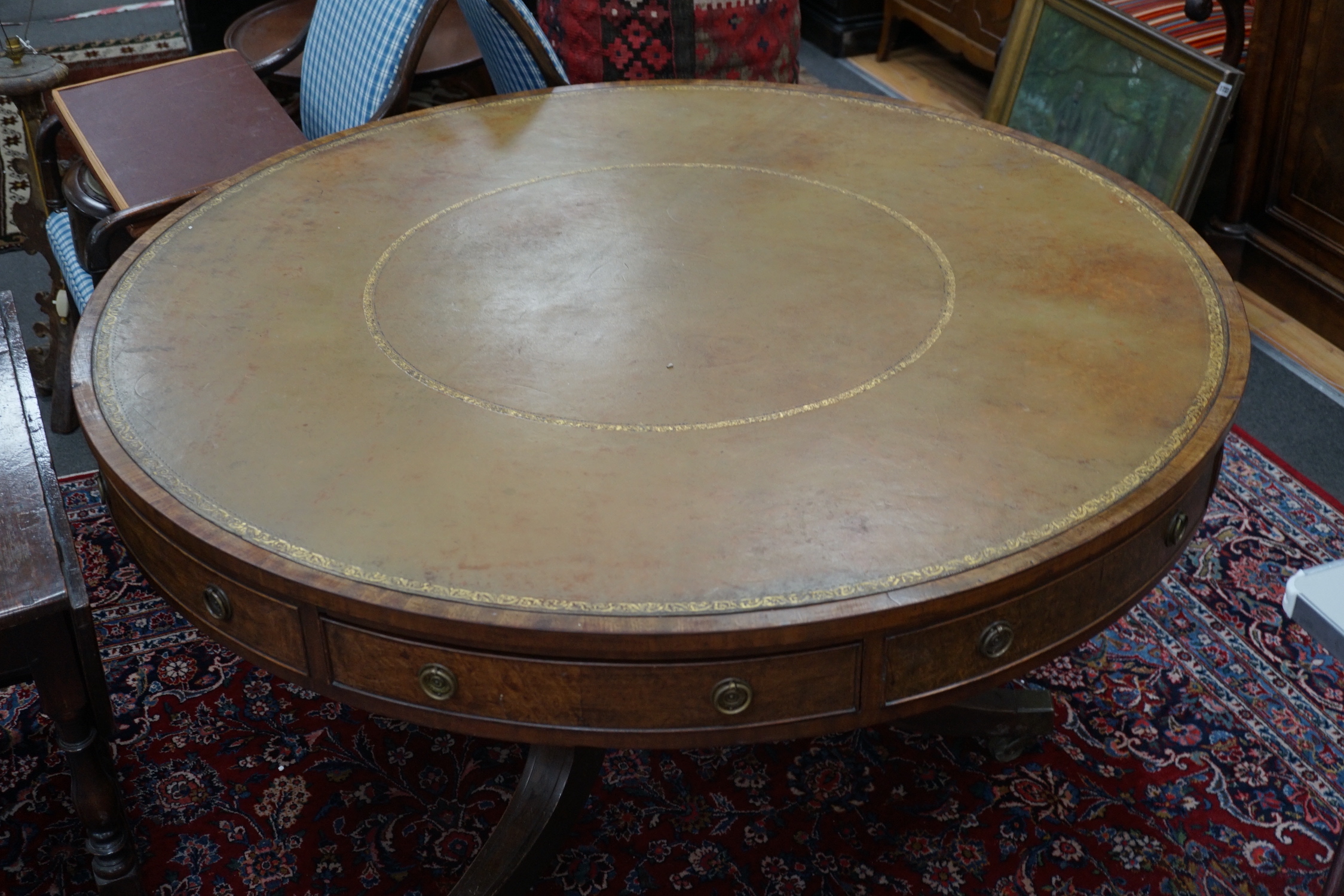 A Regency and later circular mahogany drum table, diameter 136cm, height 74cm